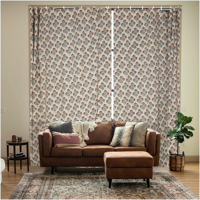Bring timeless charm and natural elegance to your space with this beautifully designed block print ring curtain. Made from...