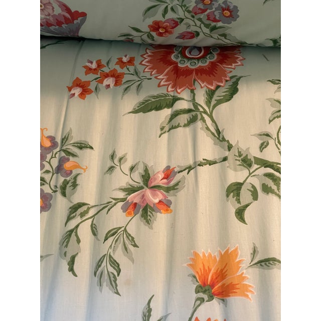 Vintage 1959 th custom made floral chintz loveseat sofa in blue and orange. Some fading and smudges on the back and right...