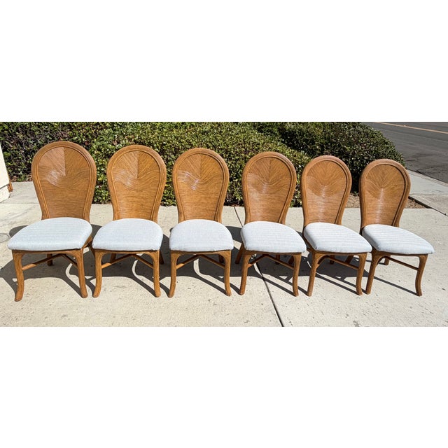 Gorgeous vintage set! These gems are constructed of hardwood frames covered in pencil reed rattan with pole rattan X...
