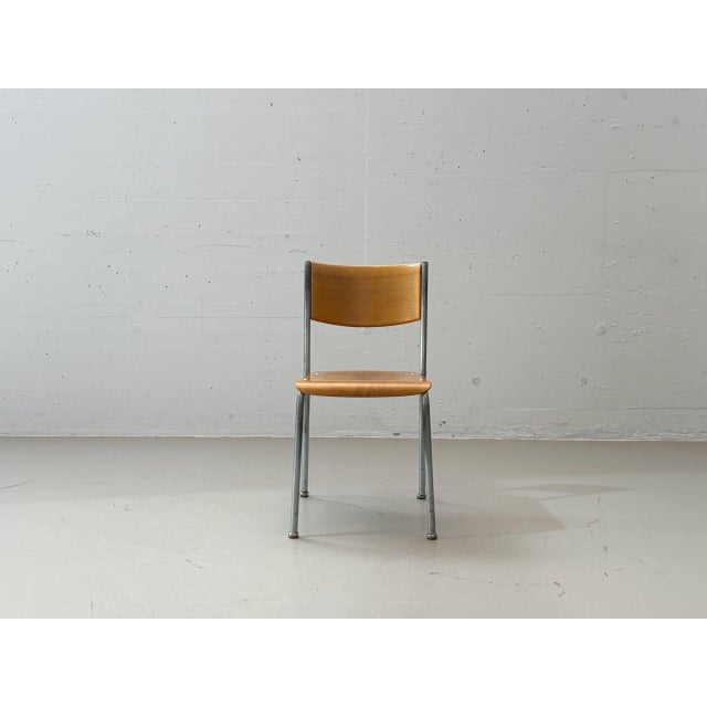 These original stackable chairs by Embru, designed by Gustav Hassenpflug, are among the most famous Swiss design classics....