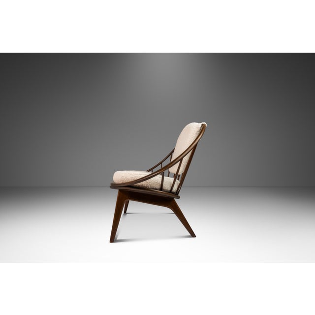 Introducing a true Danish Modern masterpiece: an ultra-rare "Peacock" or "Hoop" chair designed by the incomparable Ib...