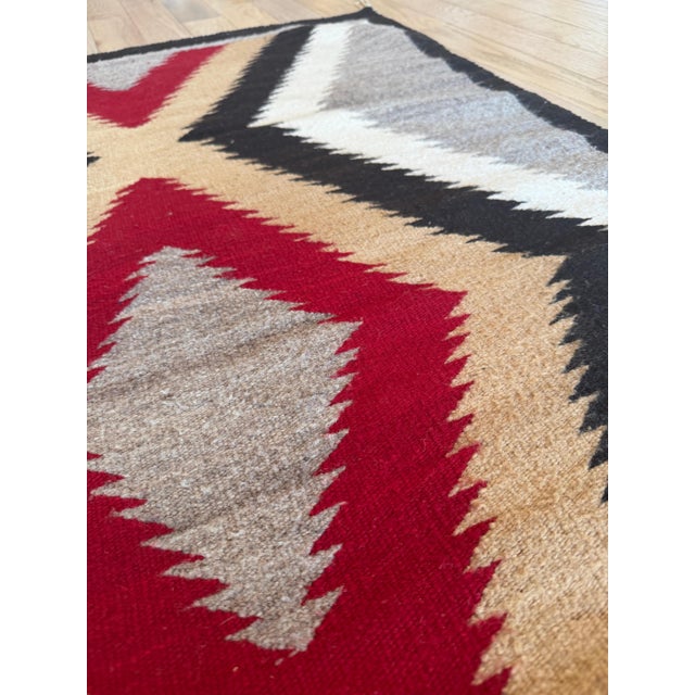 Rhythm of the Four Directions: A Mid-20th Century Navajo Chevron Rug, Handmade For Sale - Image 9 of 18