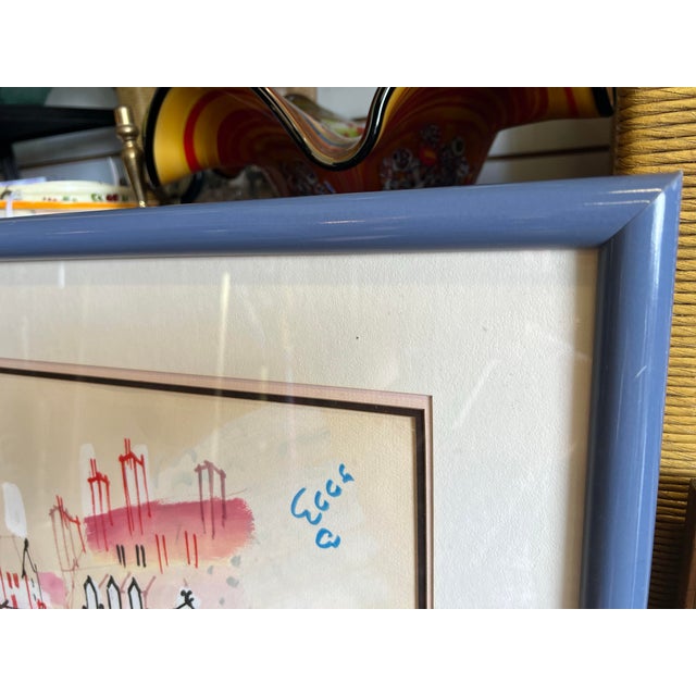 Original, one of a kind oil on paper artwork “By the Canal”. Framed in a simple blue wood frame that compliments the...