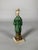 Sculpture of a court lady, China, Ming Dynasty (1368-1644), terracotta sculpture with green and brown glaze. Depicts a...