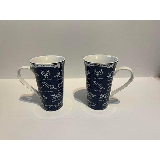 Pair of tall mugs. Anchor your mornings with a touch of maritime charm with these Nautical Knots Latte Coffee Mugs . 222...