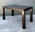 This striking Parsons-style desk is a masterclass in minimalist architectural design with a touch of Art Deco flair....