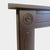 A pair of bangor or '' plum"" slate fireplaces from the regency period. Both with shaped mouldings to front panels, with...