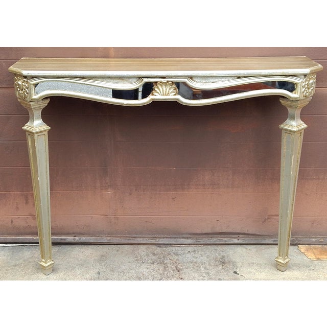 20th Century Italian Silvered and Mirrored Wall Console Table. Measures 40" in with, 10" in depth and stands 30" tall.