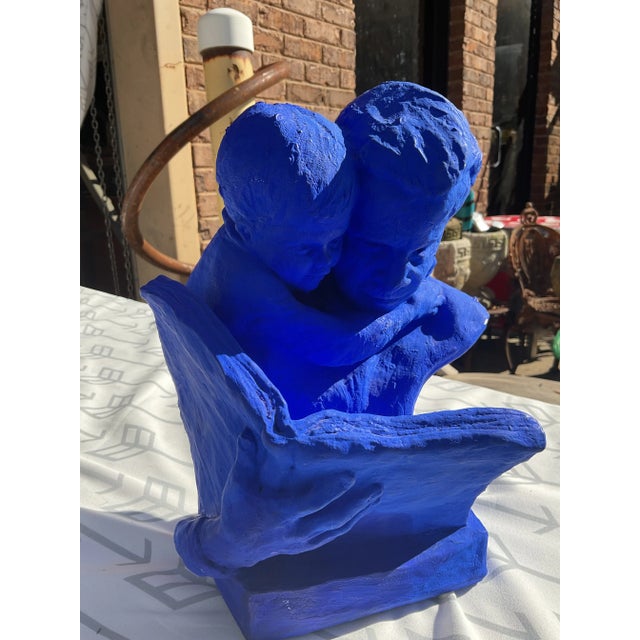 Up for your consideration is a beautiful royal blue painted bust of a father and son reading together. This would be a...