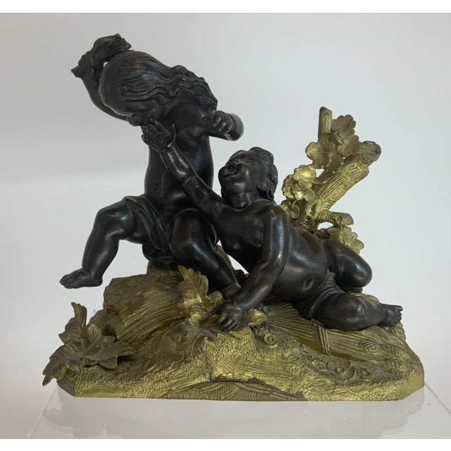 Antique French bronze sculpture on gilt base or two infants playing outside.Wonderful expressions and detail. Letter G...