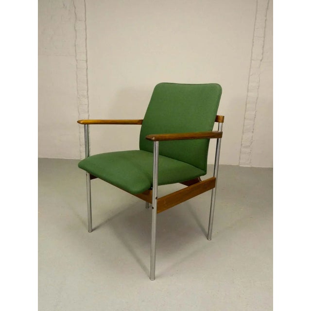 - Dutch dining chair in the style of Sven Ivar Dysthe - Manufactured for Fristho in the 1960s - Features a stainless steel...