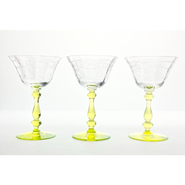 Set of 3 Vaseline-Uranium Etched Flowers Optic Coupe Champagne Glasses 5.5” 6oz” Excellent condition. No chips, cracks, or...