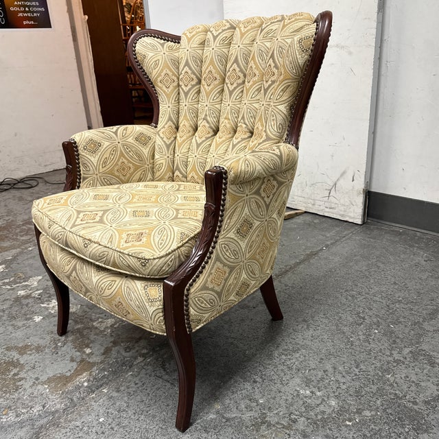 Design Plus Gallery presents a Tufted Channel Wingback Arm Chair. This vintage chair has been reupholstered in a geometric...