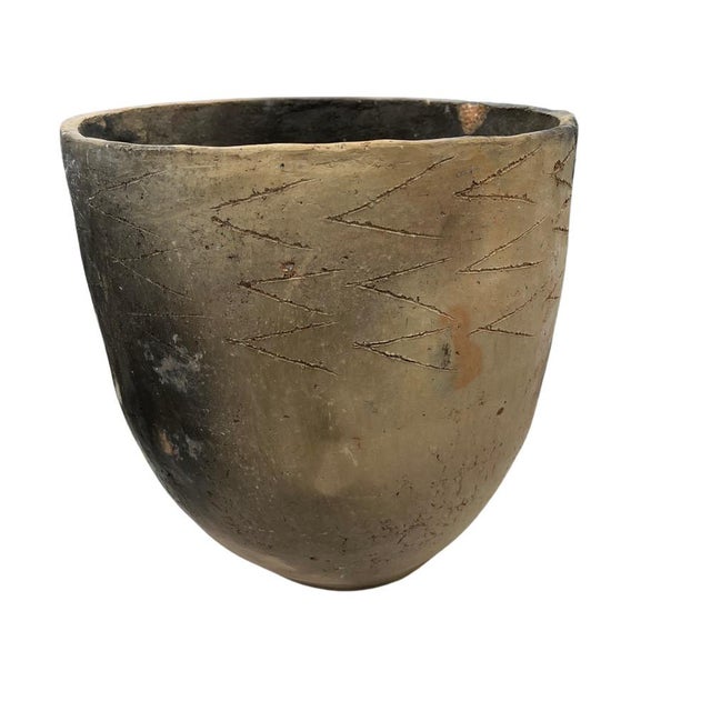 This Gafsa clay vessel hails from Tunisia, specifically the town of Gafsa known for its pottery craftsmanship. This...