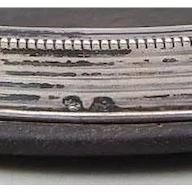 Set of four antique 19th century Dutch .833 silver wine coasters with ebony bases. Very high quality production....