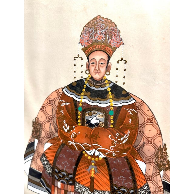 Classical Chinese ancestral portraits rendered in very 1970's burnt orange and gold. Exquisitely detailed, these are most...