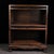 This is a beautifully crafted vintage display cabinet or storage unit, made from rosewood (huali wood) with a rich, warm...