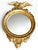 A striking vintage 1960s wall mirror featuring an elaborate gilt eagle crest surrounded by scrolling acanthus leaves,...