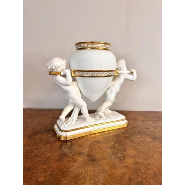 Large quality antique 19th Century Minton centrepiece, having a large antique 19th century Minton centrepiece with two...