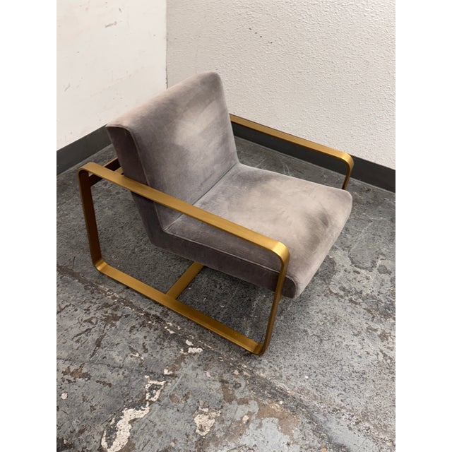 Design Plus Gallery presents the Miles Chair from Restoration Hardware. With its high-polish ribbon frame and upholstered...