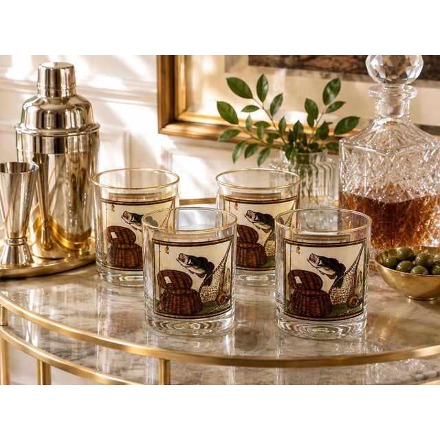 A distinctive set of four vintage sporting glasses featuring original artwork by North Carolina artist Brent Atwater. Each...