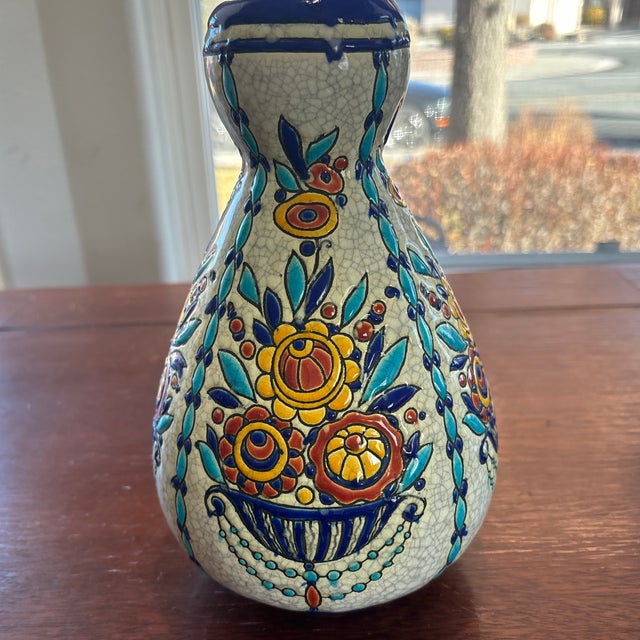 An Art Deco vase designed by Charles Catteau for Boch Keramis for the group of pieces in the Atalier de Fantasie...