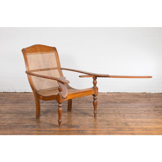 Early 20th Century Dutch Colonial Indonesian Cane and Wood Plantation Chair with Extending Arms For Sale - Image 5 of 12