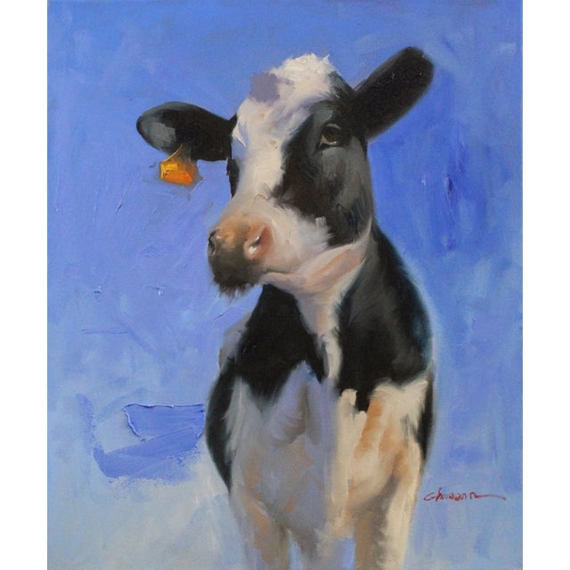 Black Cow by Ali Ghassan | Oil Painting of a black and white cow against a blue background For Sale