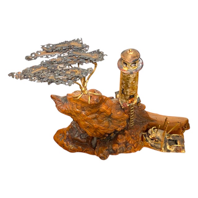 A beautifully made mixed-media sculpture by California artist Frank Sunseri, known for combining metalwork with naturally...