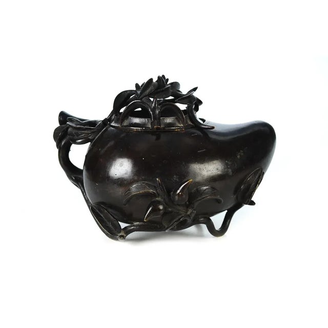 This is an 18th c. Chinese longevity peach bronze incense burner. A beautiful piece that will add to your décor!