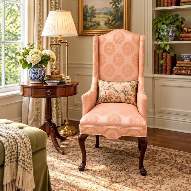 An unusually tall, slender Queen Anne–style wing chair: just 22" wide but 45" high. The narrow footprint suits smaller...