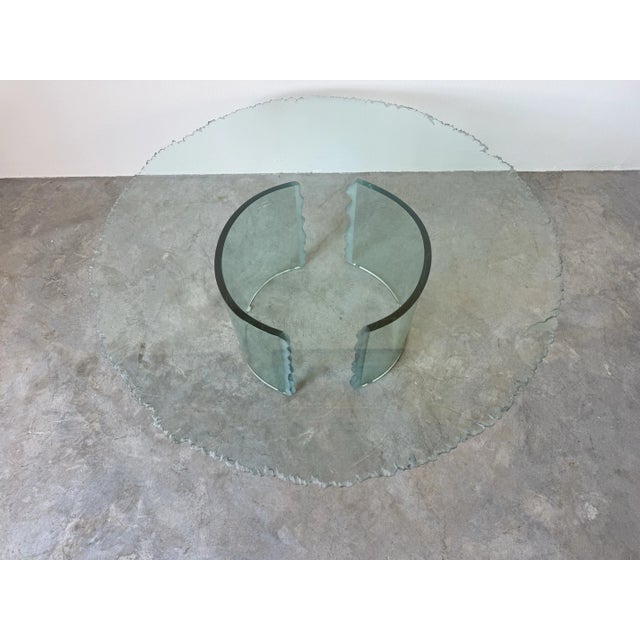 I'm pleased to offer for sale this stunning Vintage sculptural hand-carved glass coffee table in the manner of Danny Lane....