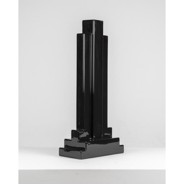 This ceramic piece is part of the Yantra series by Ettore Sottsass, a collection of thirty-nine forms including...