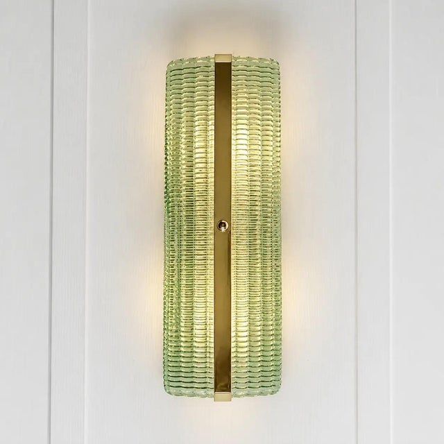 Set of four green diamanted murano glass wall sconces with metal frame on view in chrome. murano glass with a diamanted...