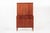 This vintage mid century Danish modern tall teak wood storage cabinet is circa 1960. This unique cabinet is elegantly...
