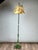 This unusual and highly decorative antique floor lamp beautifully captures the playful geometric styling and vibrant...