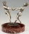 Whirling, spectacular circular marble centerpiece with a bronze sculpture of two dancing girls holding hands by the French...