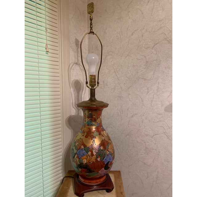 Stunning, piece of art large hand painted porcelain table lamps on a brass base. lamps are working. This is a Chinese...