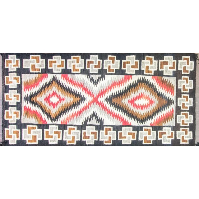 Antique Large Navajo eye dazzler rug with black, white, red and grey. in perfect condition.