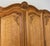 Vintage Louis XVI French Oak Four Door Carved Armoire For Sale - Image 4 of 11