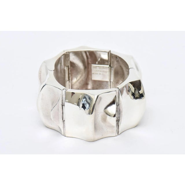 This is part of Chairish’s Costume Jewelry assortment. This hallmarked and signed Scandinavian modern sculptural thick...