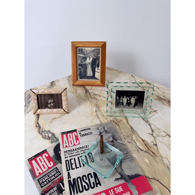 Large Italian tabletop picture frame, dating to the mid-20th century and handcrafted in embossed copper sheet. Dating...