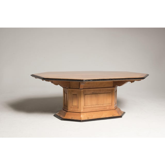 Art Deco Table form Italy from 1930s period. The table is made in cherry wood, features black borders and brass studs on...