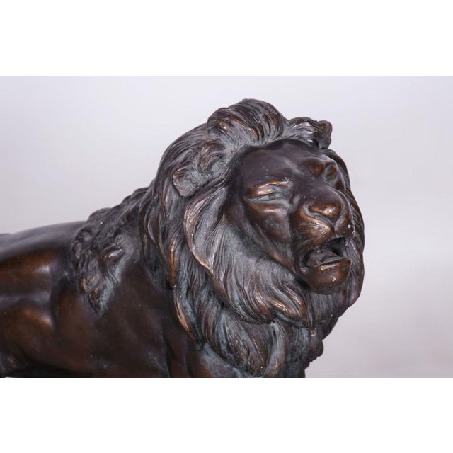 This monumental lion statue is a fascinating example of Austrian production from the early 20th-century Art Deco period....