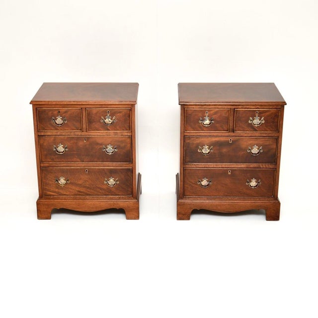A beautiful pair of antique bedside chests of drawers in the Georgian style. They were made in England, they date from...