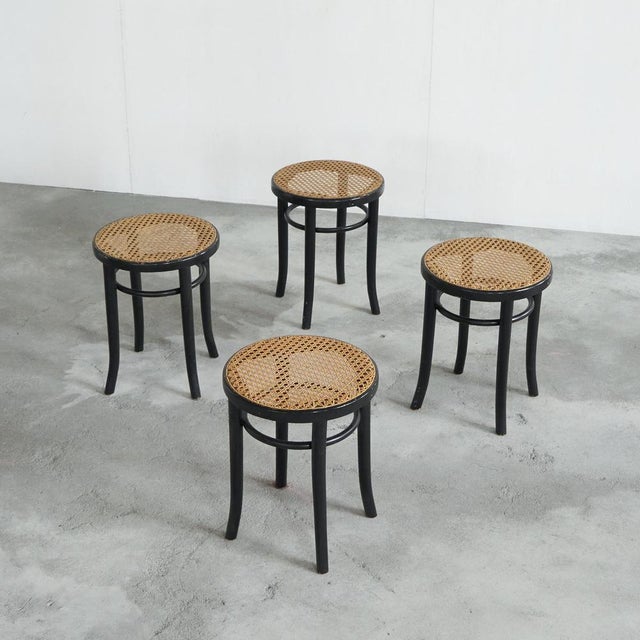 This is a wonderful set of Thonet style stools in black lacquered bentwood and webbing. Made in Europe in the 1970s. Very...