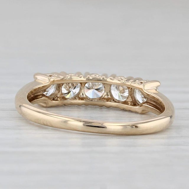 Gemstone Information: - Natural Diamonds - Total Carats - 0.85ctw Cut - Round Brilliant Color - H - J Clarity - VS2 - SI2...