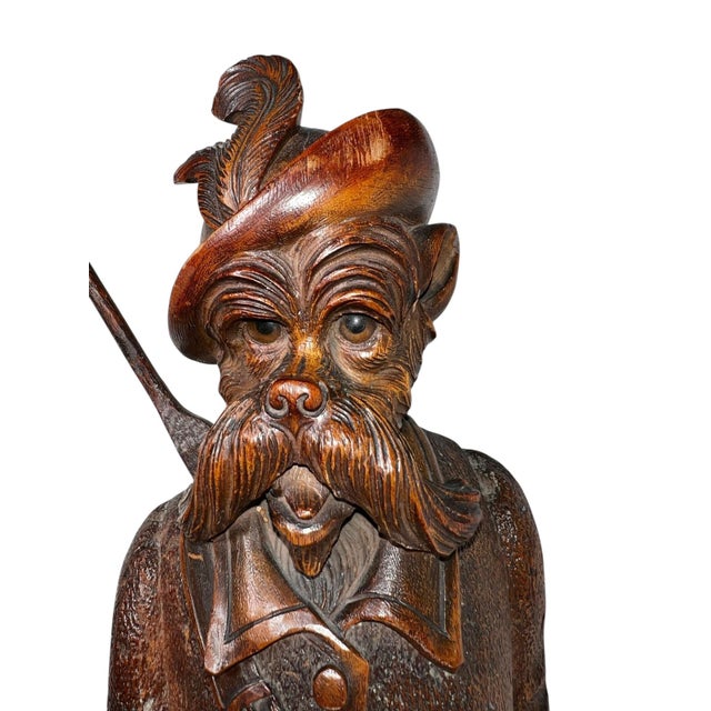 The whip carved wood fox music box with glass eyes, is a finely crafted example of late 19th century decorative carving...