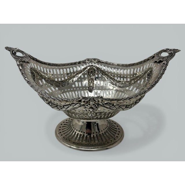 An Exquisite Georgian Style Dublin Silver Heavy Gauge Table Centerpiece of traditional oval outline in the Rococo manner,...