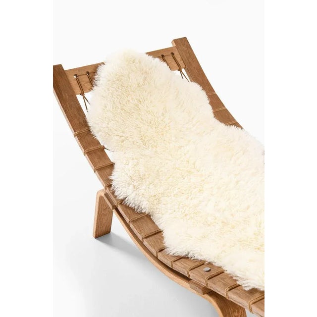1960s Lounge Chair in Oak and Sheepskin attributed to Hans Wegner, 1960s For Sale - Image 5 of 11